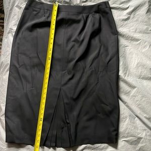 Talbots wool pencil skirt with pleat in back.  98% wool, 2%Lycra.